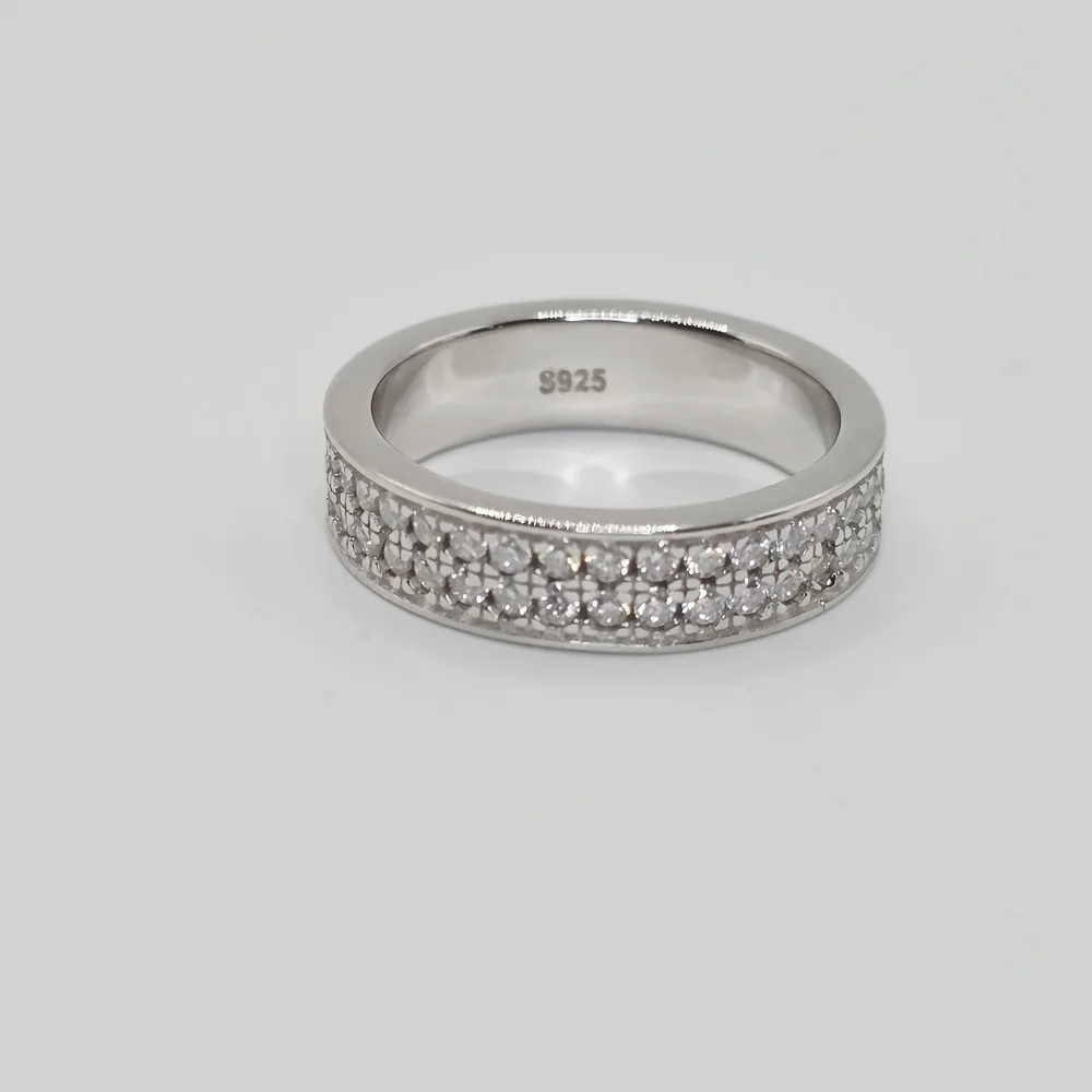 This is a 2 Row Moissanite Diamonds Band . S925 Silver. vvs1 D. size 7